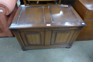 An oak linenfold panel blanket chest