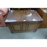 An oak linenfold panel blanket chest