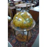 A terrestrial globe cocktail trolley