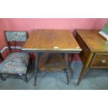 A Victorian oak centre table