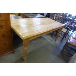 A Victorian style pine farmhouse kitchen table