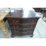 A mahogany serpentine chest of drawers