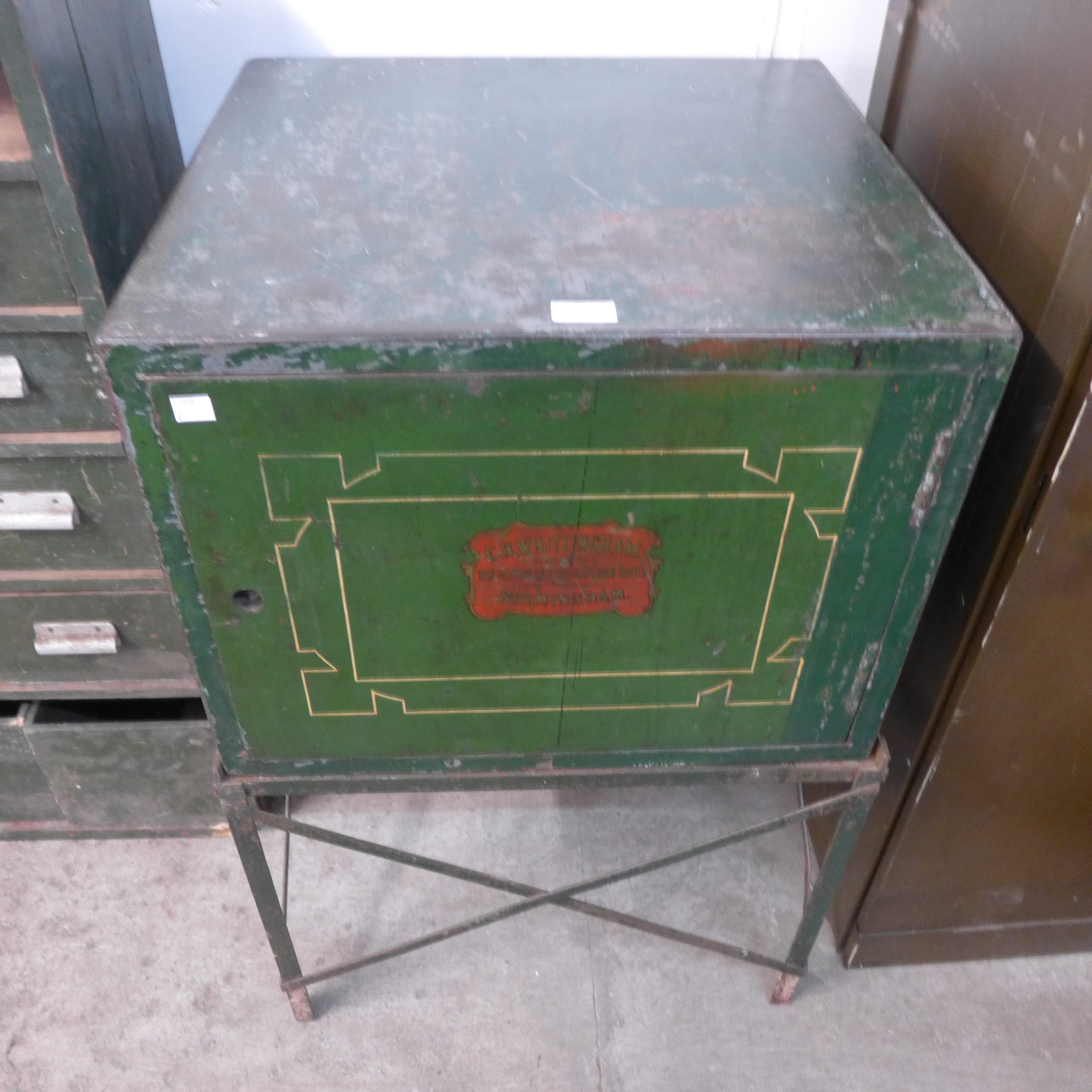 A steel deed box on stand, C.H.Whittingham, Birmingham