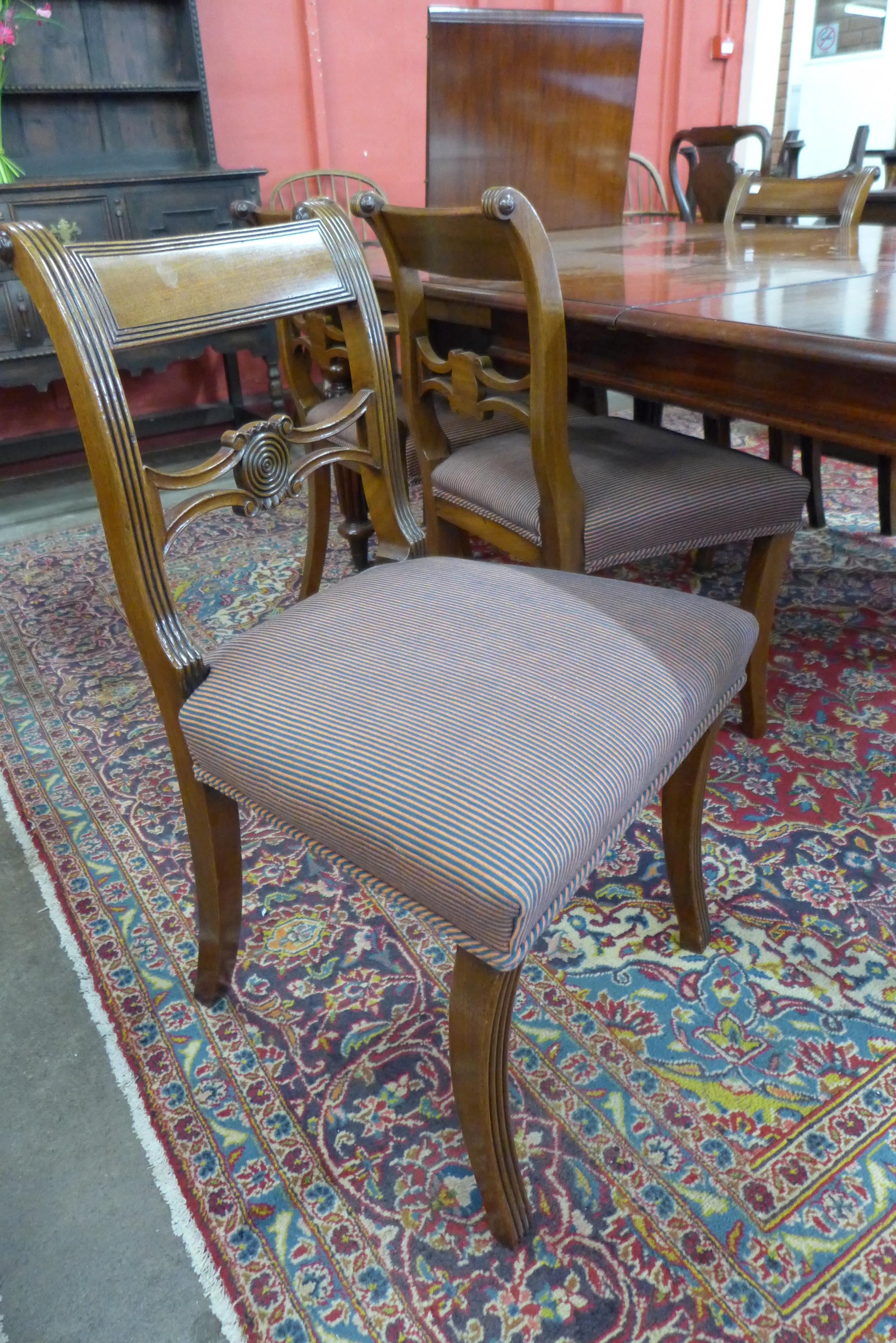 A Victorian mahogany extending dining table and six Regency style chairs, table dimensions; 72cms h, - Image 3 of 5