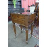 A George IV mahogany drop leaf two drawer night stand