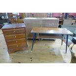 A small inlaid mahogany chest of drawers and a teak occasional table