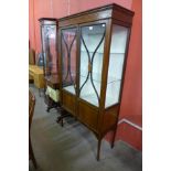 An Edward VII inlaid mahogany side cabinet