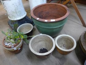 Six glazed terracotta plant pots