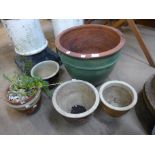 Six glazed terracotta plant pots