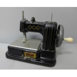 A child's Vulcan toy sewing machine