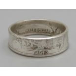 A ring made from a US half-dollar coin, Y