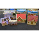 Three boxed sets of Sylvanian Families; Boutique, Orchard Cottage and Copper Beech Cottage