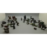 A collection of lead figures including mythical