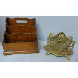 A wooden letter rack and a brass letter rack