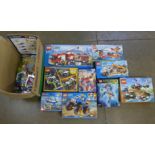 A collection of Lego, four Lego City box sets, two Lego Creator box sets, Bionicle, Spiderman and