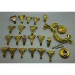 A brass door knocker and twenty brass picture rail hangers