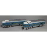 Two Lionel O Gauge 3 rail F3 locomotives, one powered with twin motor #2333 chassis & one dummy.