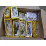A box of dolls and dolls house furniture