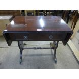 A mahogany drop-leaf occasional table and a mahogany bracket style quartz clock