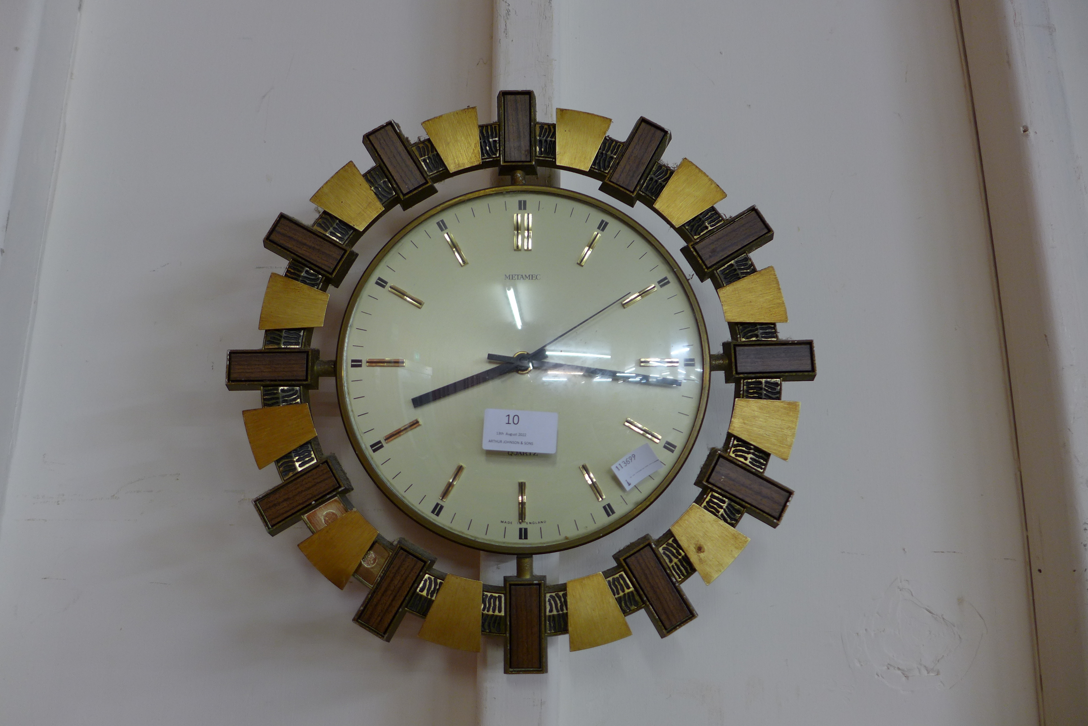 A vintage Metamec wall clock