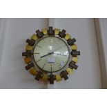 A vintage Metamec wall clock