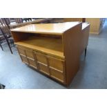 A small teak sideboard