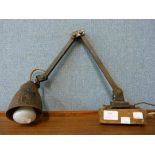 An industrial enamelled articulated lamp