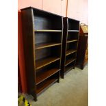 A pair of Edward VII inlaid mahogany open bookcases