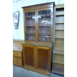 An Edward VII inlaid mahogany bookcase