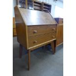 A Birchcraft of High Wycombe teak and birds eye maple bureau