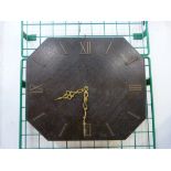 An early 20th Century oak wall clock