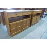 A pair of small teak sideboards