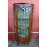 An Edward VII inlaid satinwood demi-lune display cabinet