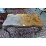 A burr walnut coffee table