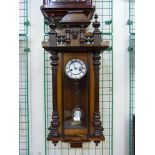 A 19th Century walnut Vienna wall clock