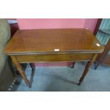 A Victorian mahogany fold-over tea table