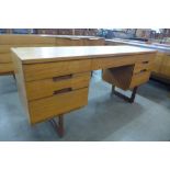 A Uniflex teak desk