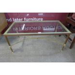 An Italian brass and glass topped rectangular coffee table