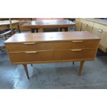 A small teak sideboard