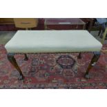 A Victorian mahogany and upholstered duet stool