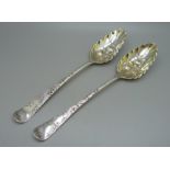 Two similar George III silver berry spoons, London 1794 and 1799, 116g