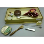 A Lalique perfume, a silver spoon, Caithness letter opener, cased cigarette holder and lighter,