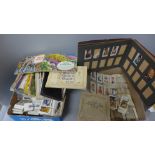 A large collection of cigarette cards