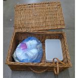 A picnic basket and picnic crockery
