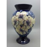 A Moorcroft vase, signed, 18cm