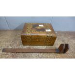 An inlaid sewing box and a wooden measure