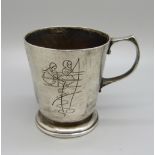 A silver christening mug with fishing scene, London 1956, 106g