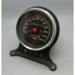 A Harley-Davidson speedometer