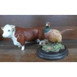 A Beswick bull, Champion of Champions, and a Country Artists pheasant