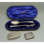 A cased silver christening set, London 1907, a silver vesta case, Birmingham 1895, 76g, and modern